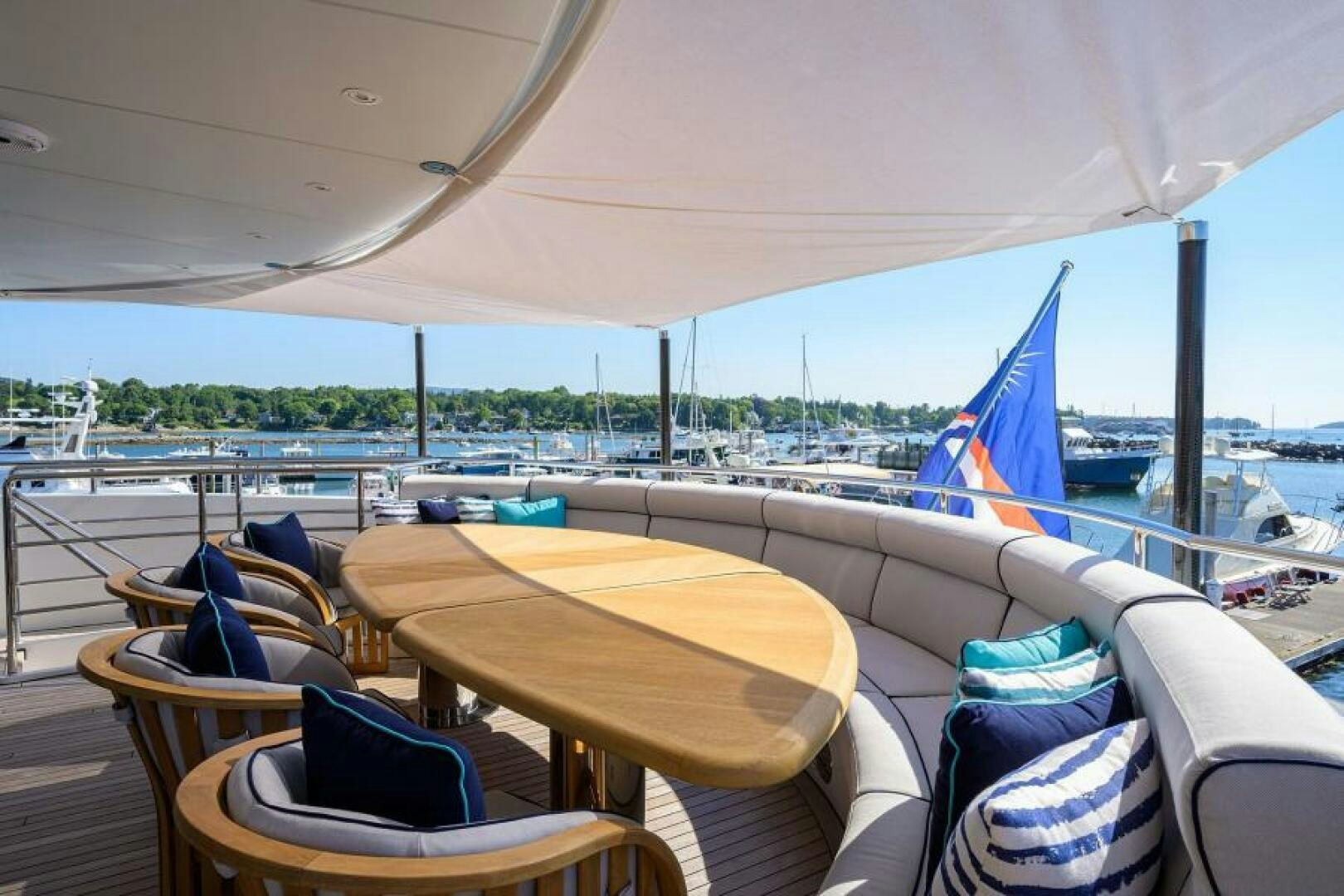 a table and chairs on a boat aboard CASTLEFINN Yacht for Sale