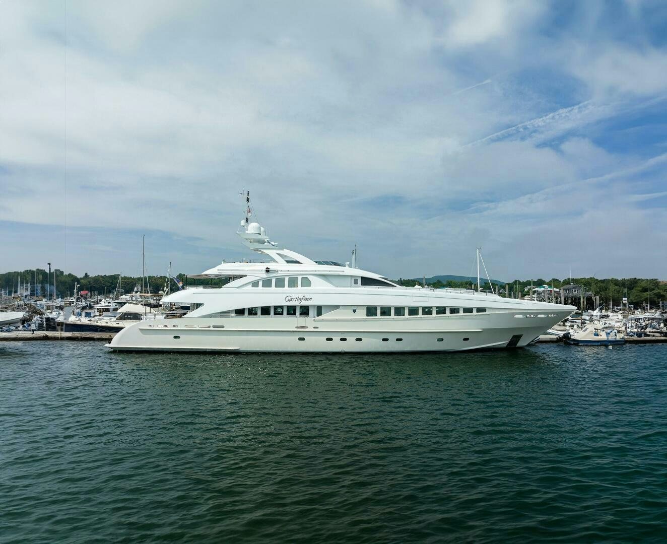 a white yacht in the water aboard CASTLEFINN Yacht for Sale