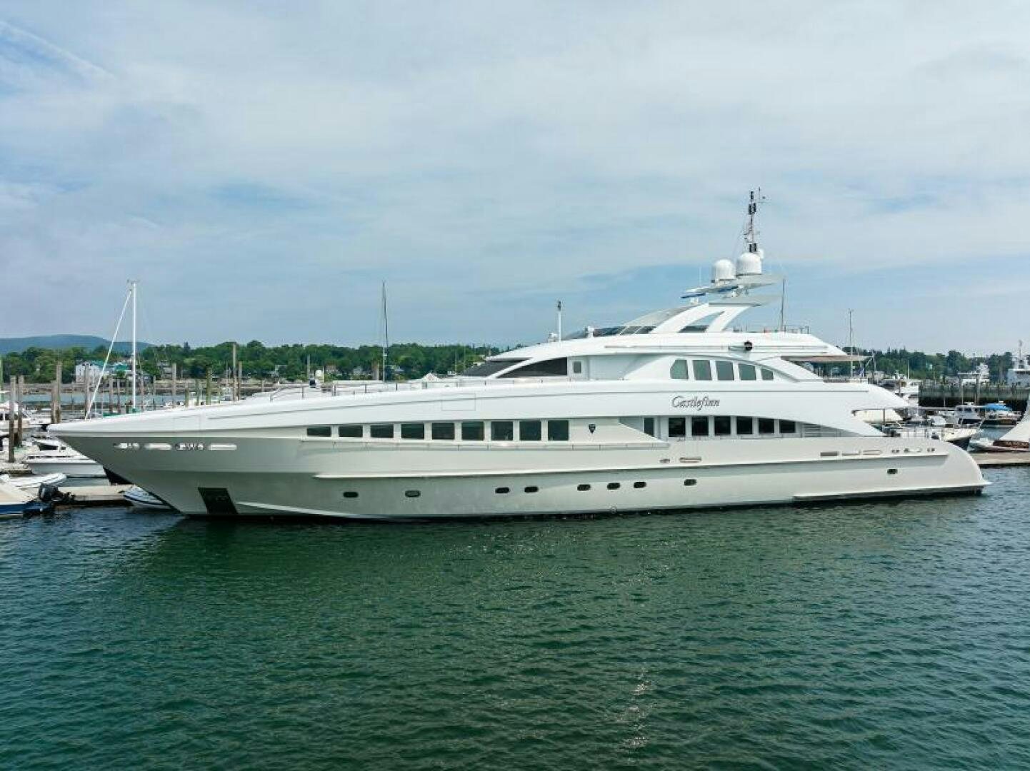 a white yacht in the water aboard CASTLEFINN Yacht for Sale