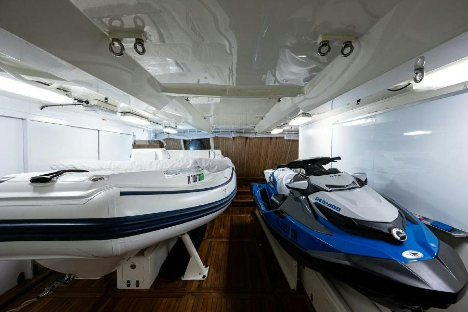 a couple of boats in a room aboard CASTLEFINN Yacht for Sale