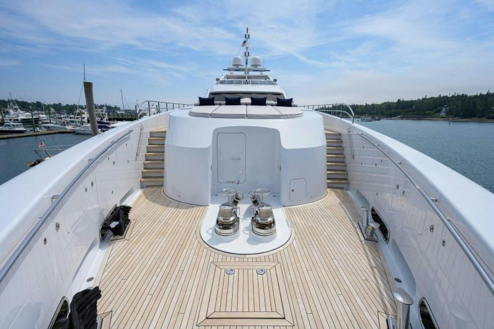 a large white ship on a dock aboard CASTLEFINN Yacht for Sale