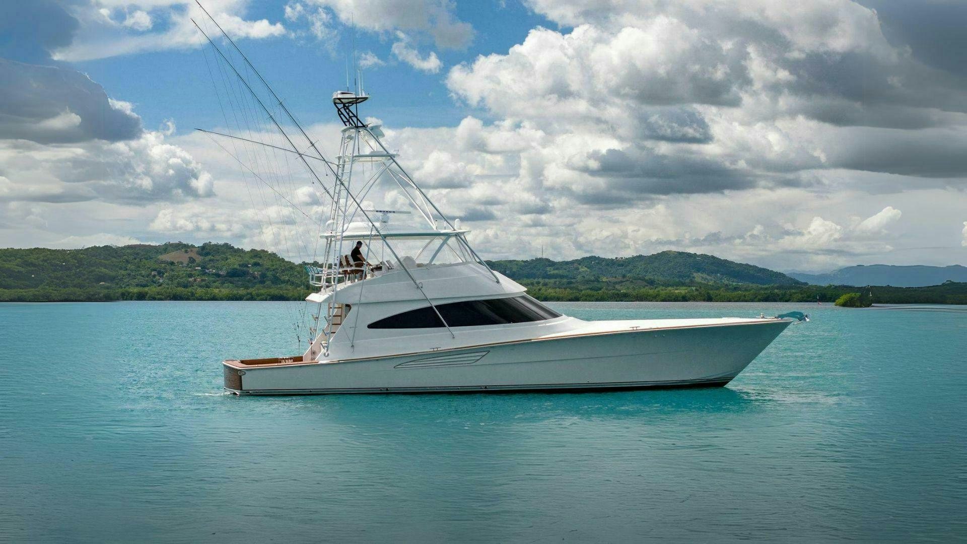 a boat in the water aboard PLAN B Yacht for Sale