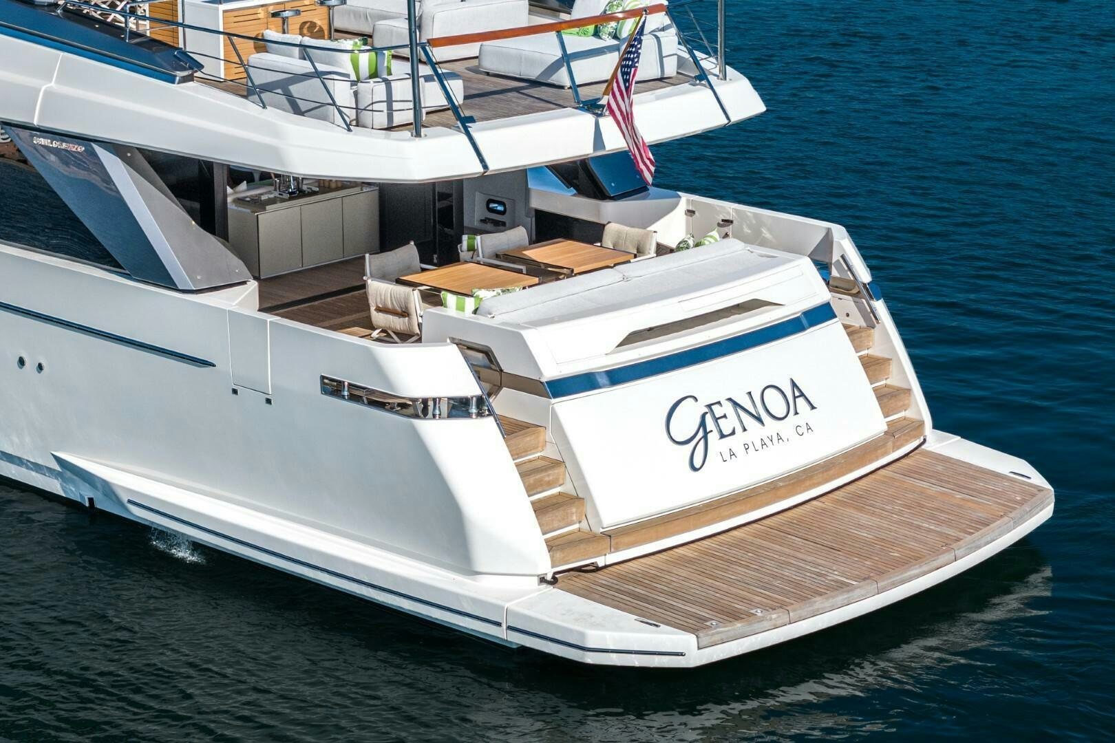 a white boat on the water aboard GENOA Yacht for Sale