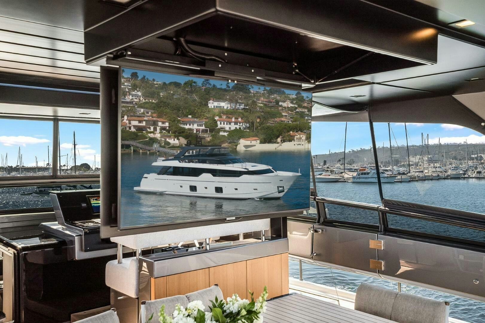 a large room with a large window and a boat in it aboard GENOA Yacht for Sale