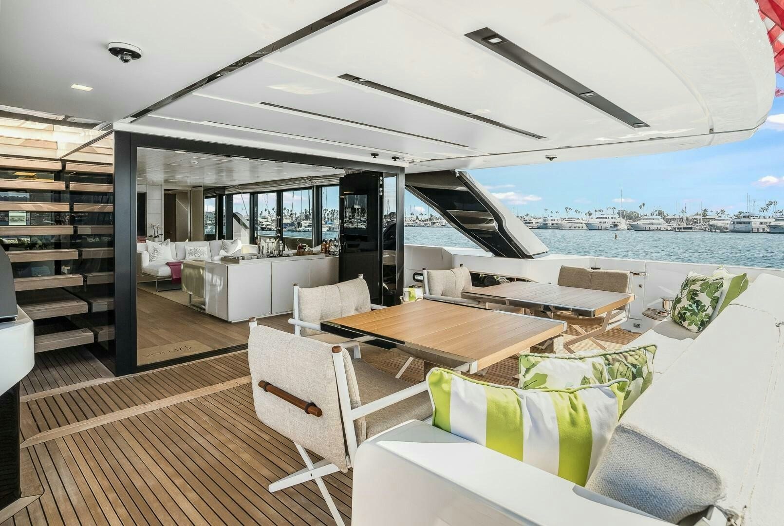 a living room with a large open door aboard GENOA Yacht for Sale