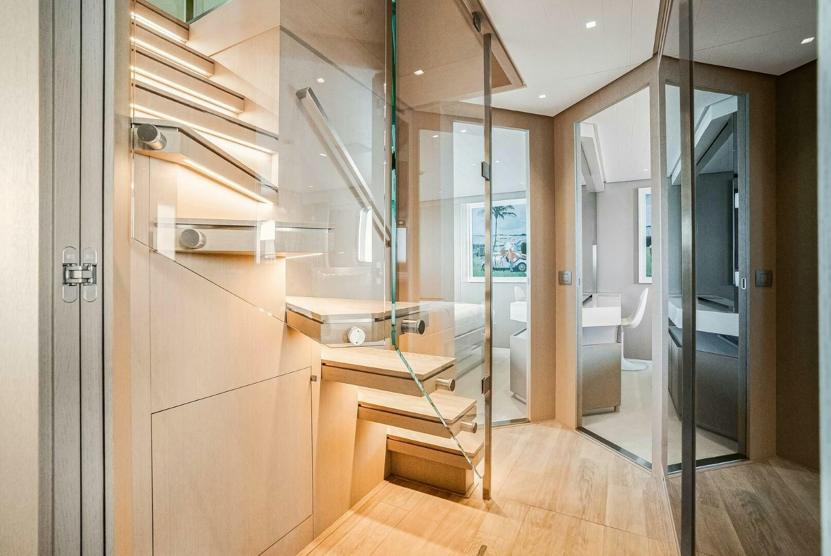 a room with a glass door and a glass wall aboard GENOA Yacht for Sale