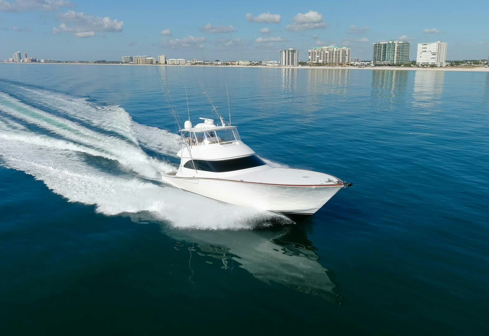a white boat on the water aboard WILD EAGLE Yacht for Sale