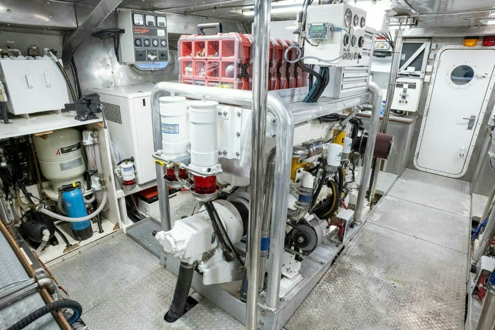 a room with machinery aboard DOZER Yacht for Sale