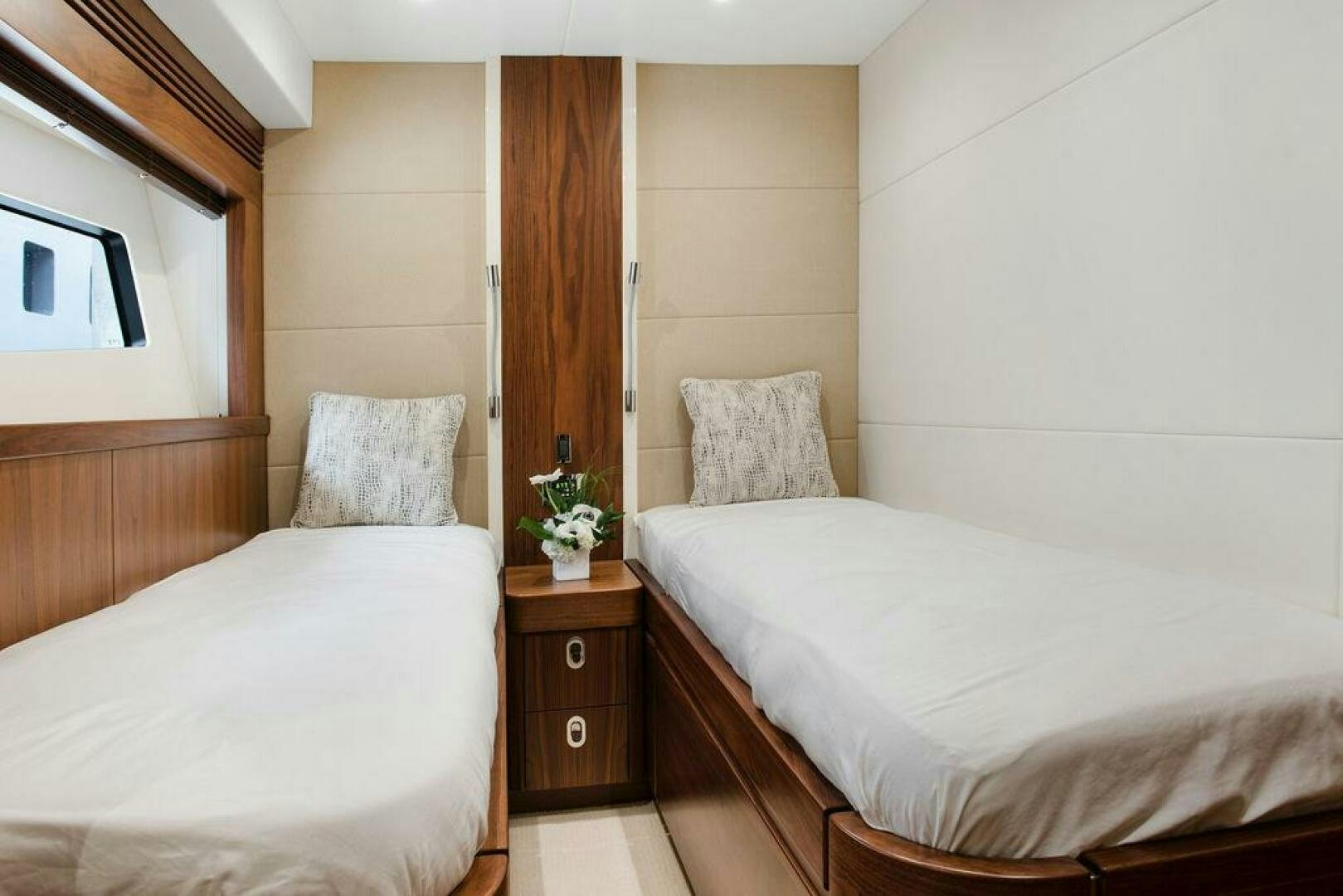 a room with two beds aboard SEA LA VIE Yacht for Sale