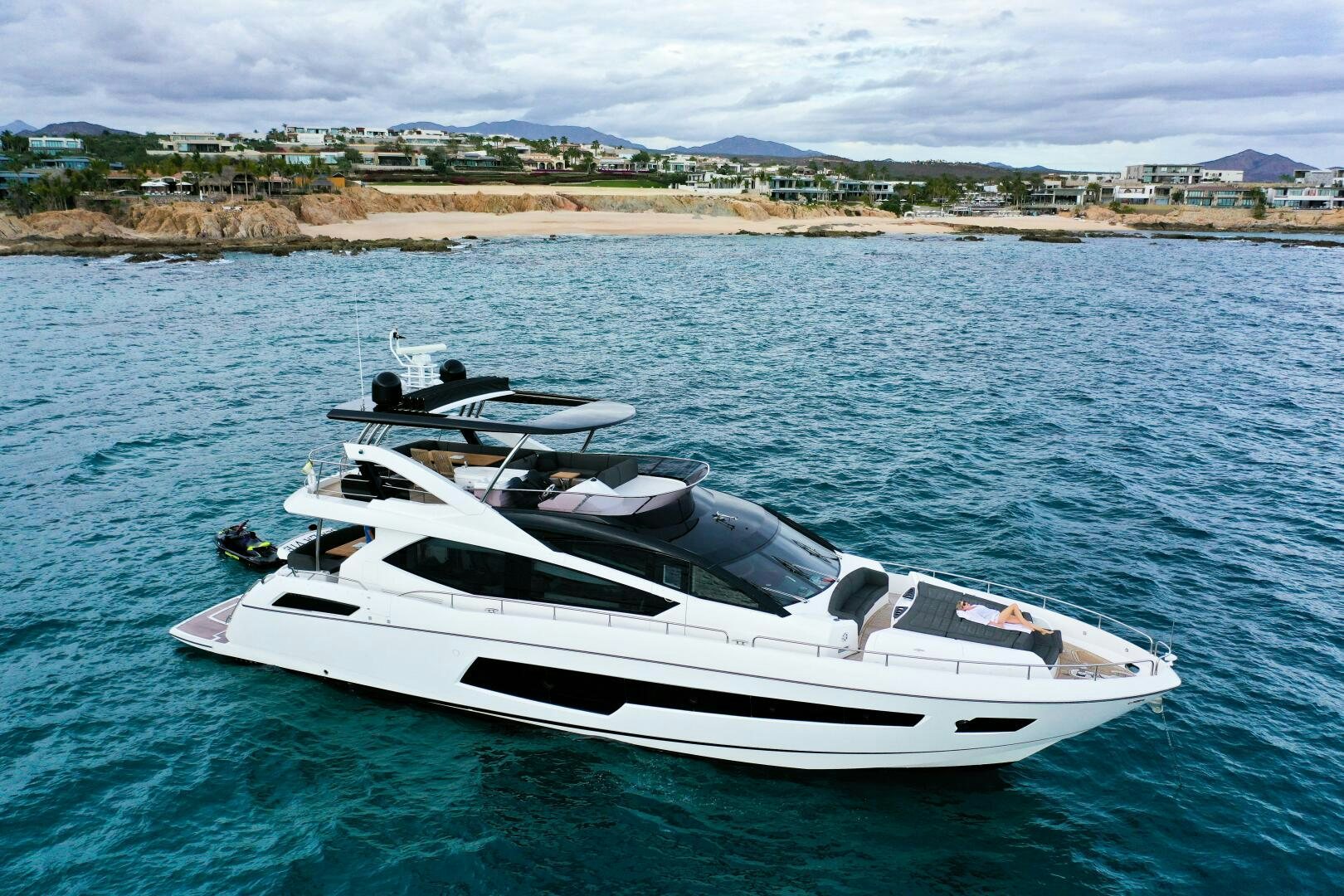 a white yacht in the water aboard SEA LA VIE Yacht for Sale