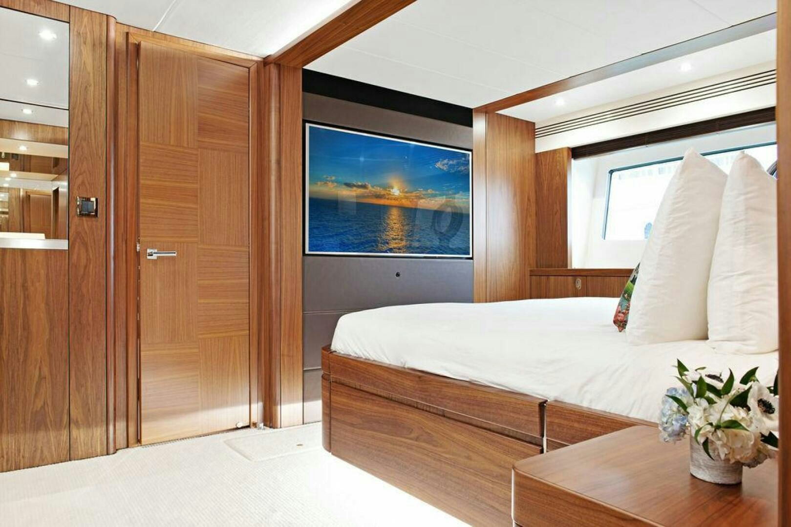 a bed in a room aboard SEA LA VIE Yacht for Sale
