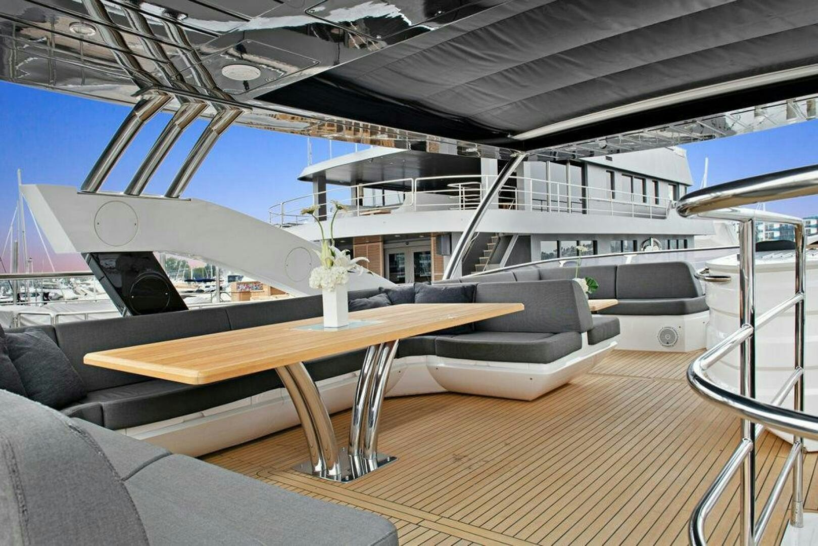 a room with a table and chairs aboard SEA LA VIE Yacht for Sale