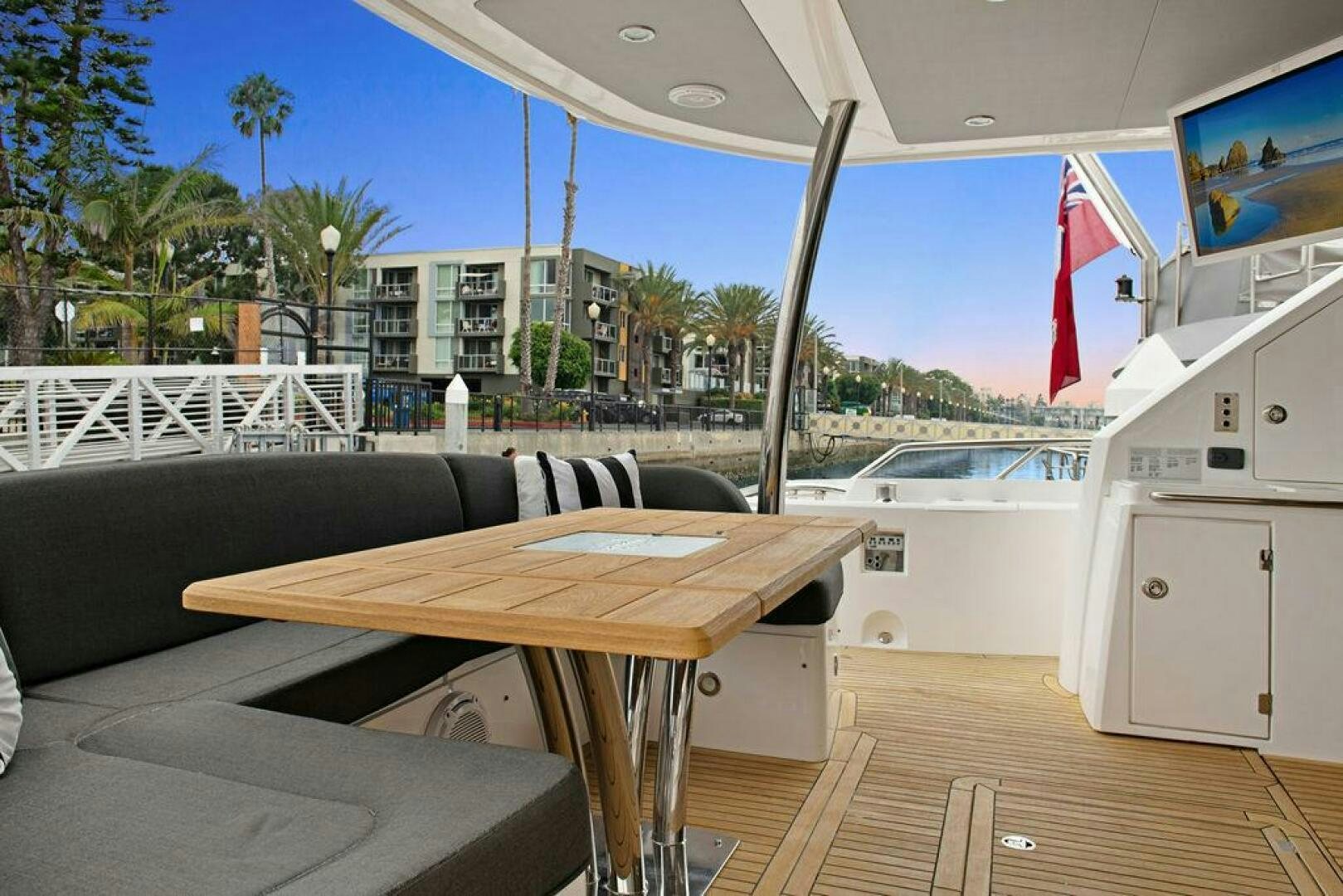 a table and chairs on a deck aboard SEA LA VIE Yacht for Sale