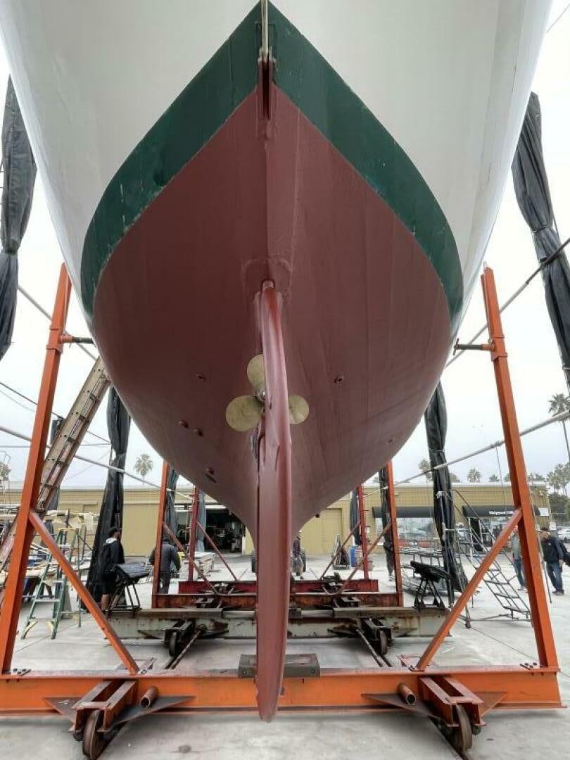 a large colorful umbrella aboard CURLEW Yacht for Sale