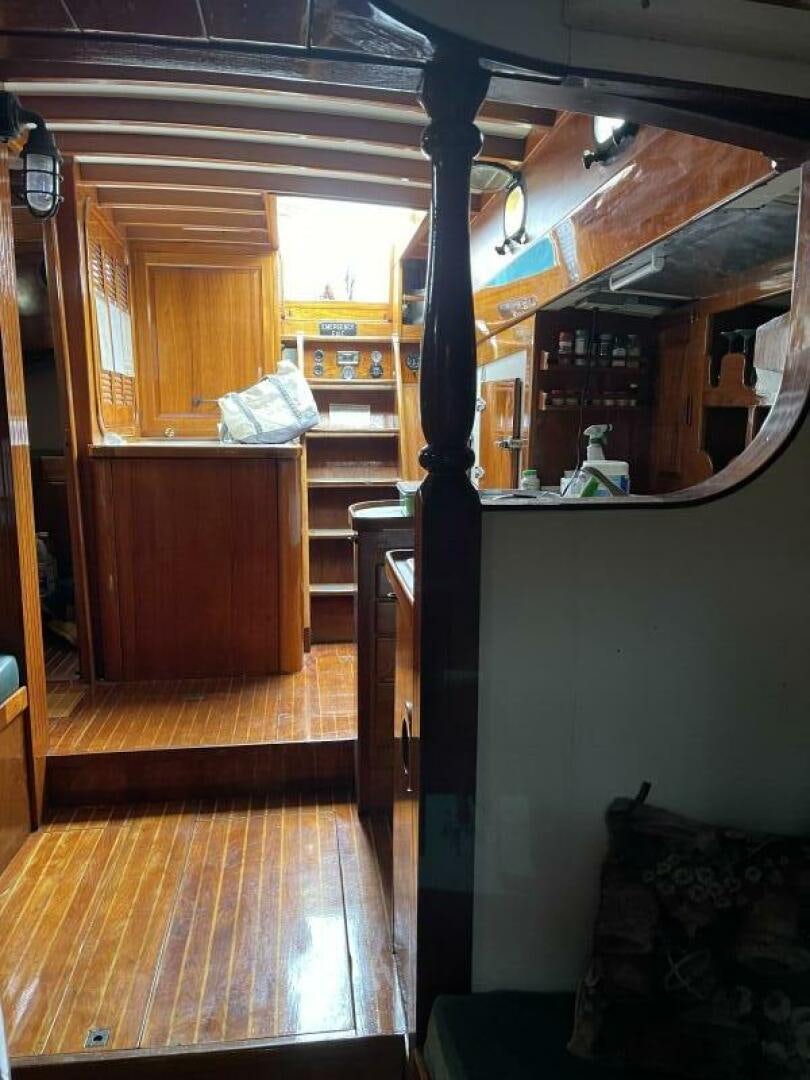 a room with wood floors and a wood floor aboard CURLEW Yacht for Sale