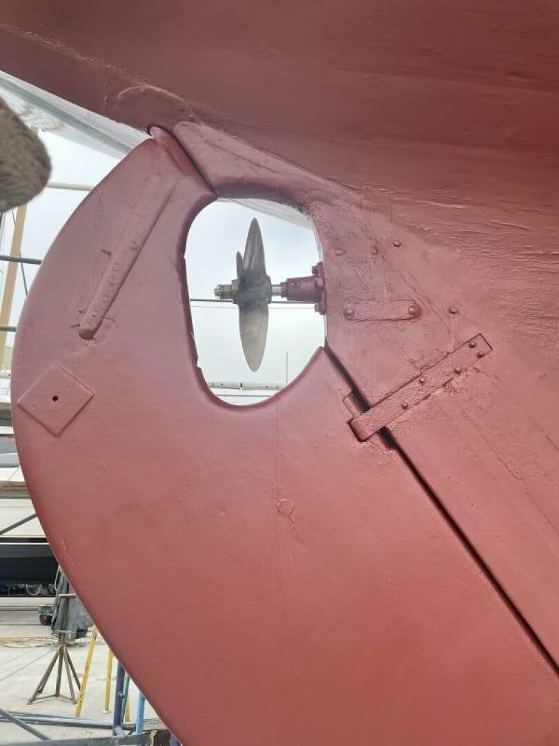 a close-up of a red vehicle aboard CURLEW Yacht for Sale
