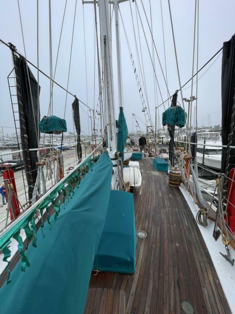 a boat dock with sailboats aboard CURLEW Yacht for Sale
