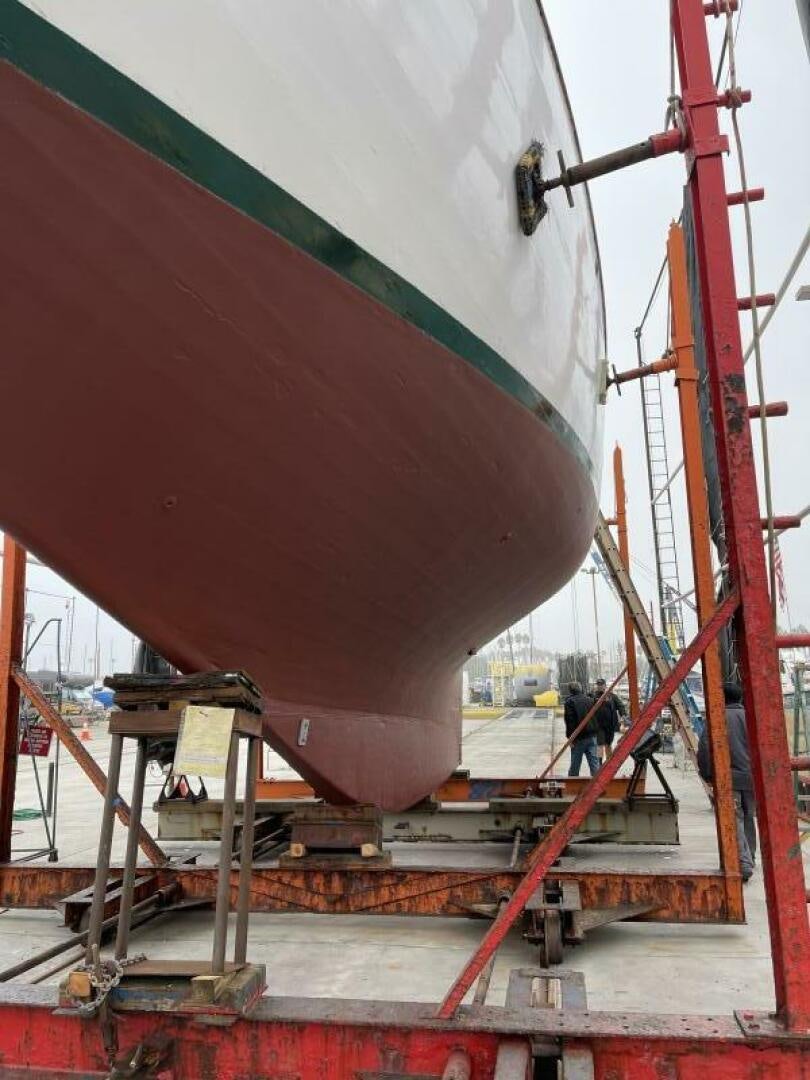 a large red ship aboard CURLEW Yacht for Sale