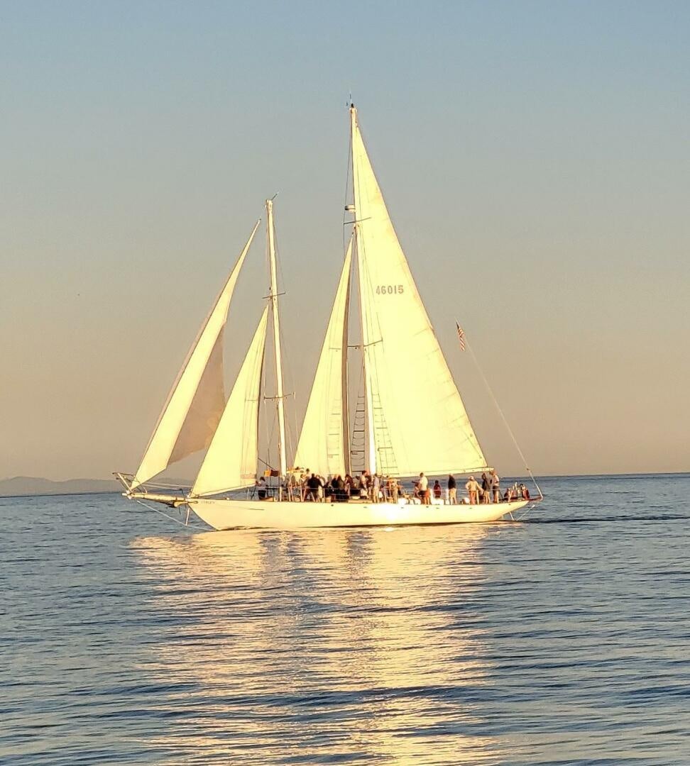 a sailboat on the water aboard CURLEW Yacht for Sale
