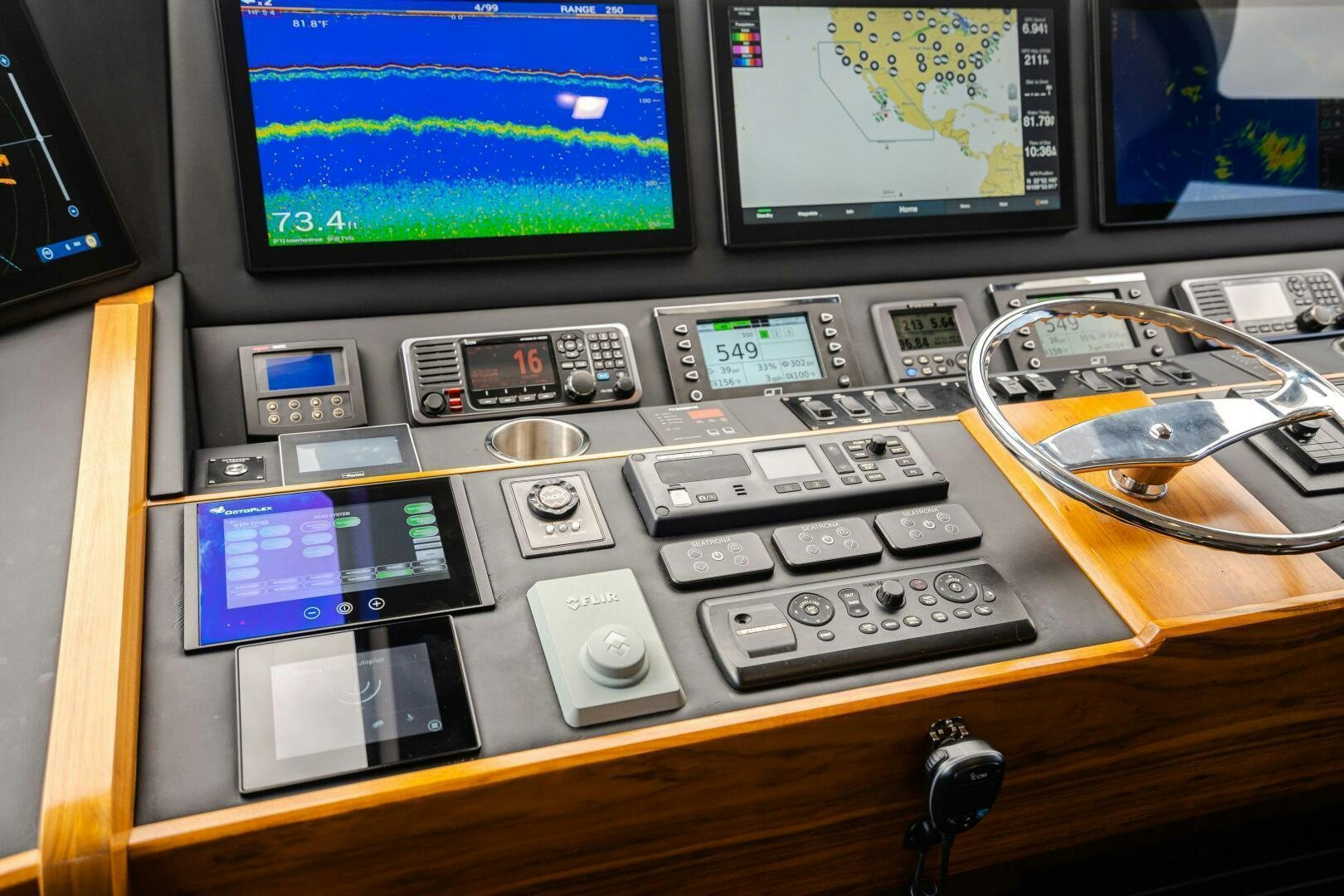 a radio with a screen and a game controller aboard HOORAY Yacht for Sale