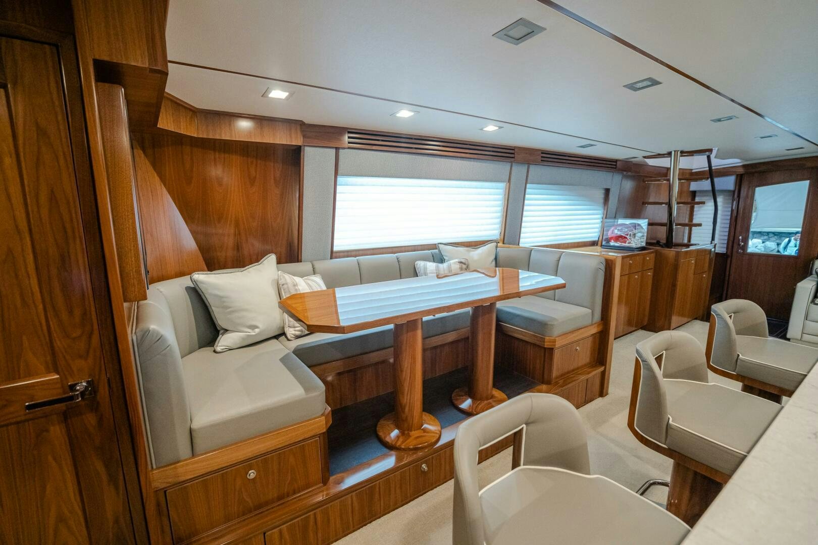 a room with a bed and a table aboard HOORAY Yacht for Sale