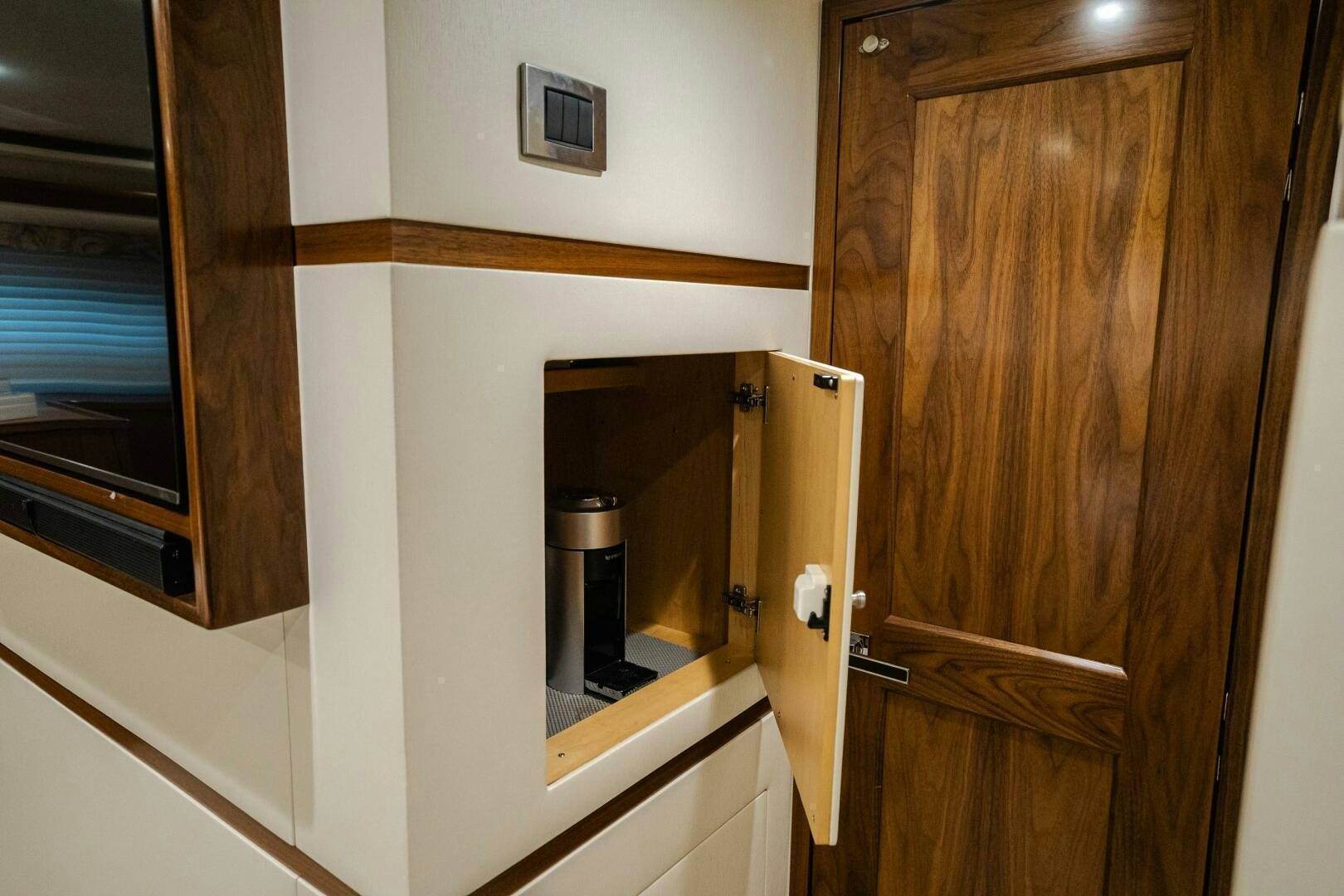 a microwave oven in a kitchen aboard HOORAY Yacht for Sale