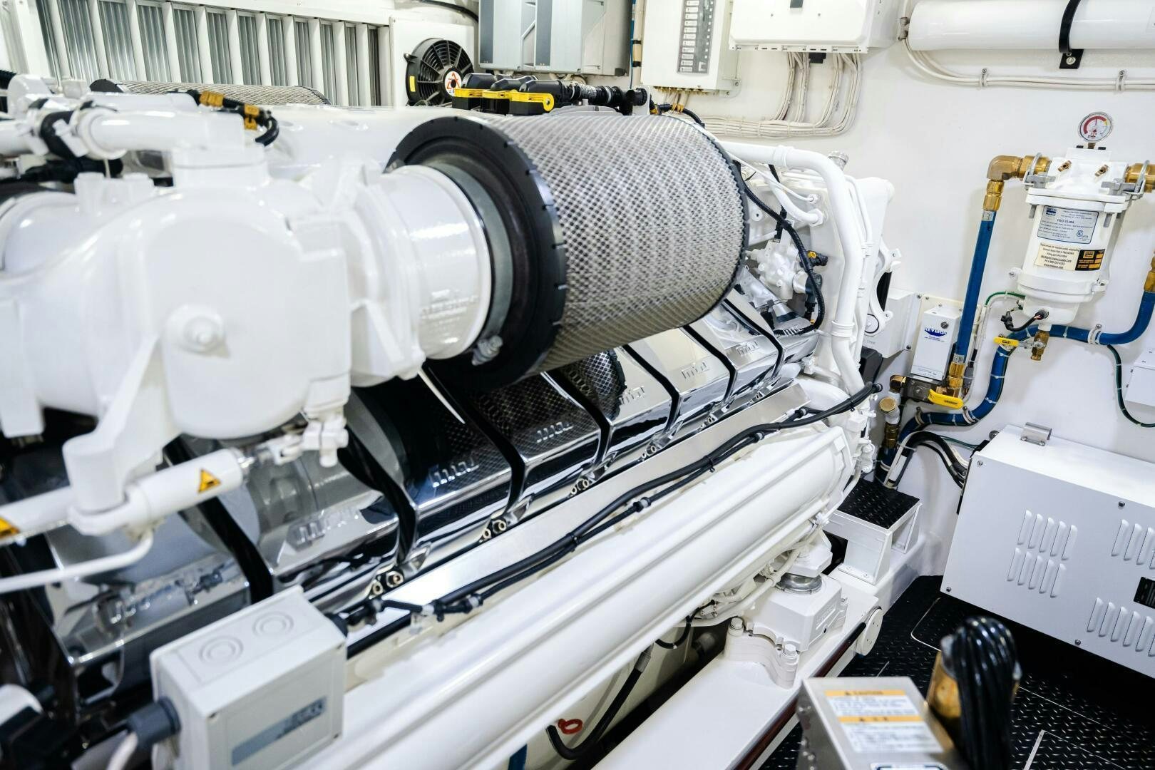 a white machine with a large fan aboard HOORAY Yacht for Sale