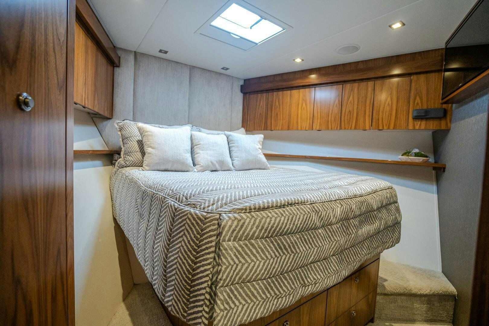 a bed in a room aboard HOORAY Yacht for Sale