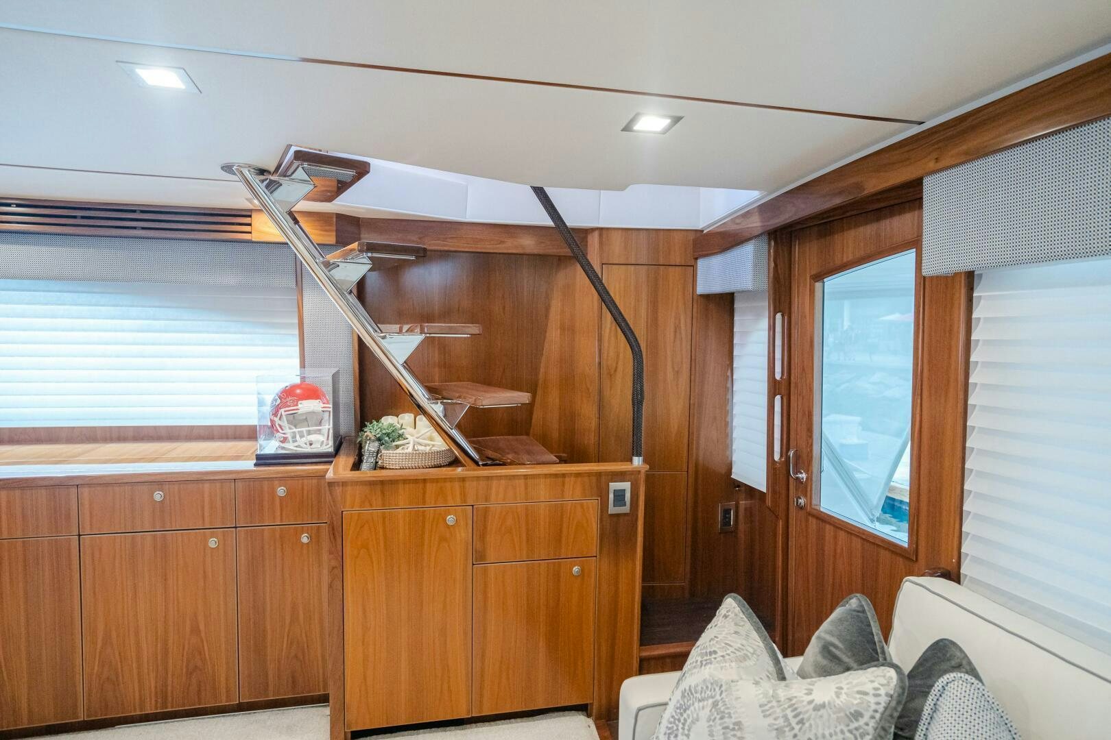 a wooden bunk bed in a room aboard HOORAY Yacht for Sale