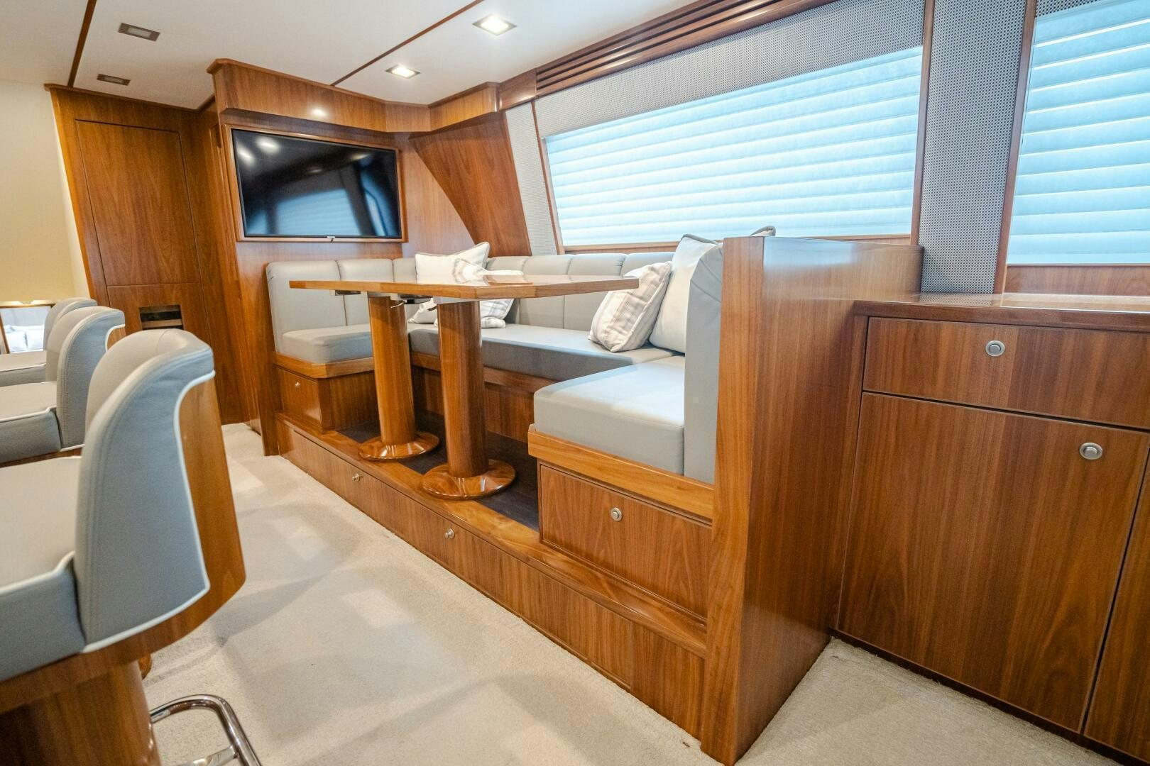 a room with a couch and a table aboard HOORAY Yacht for Sale
