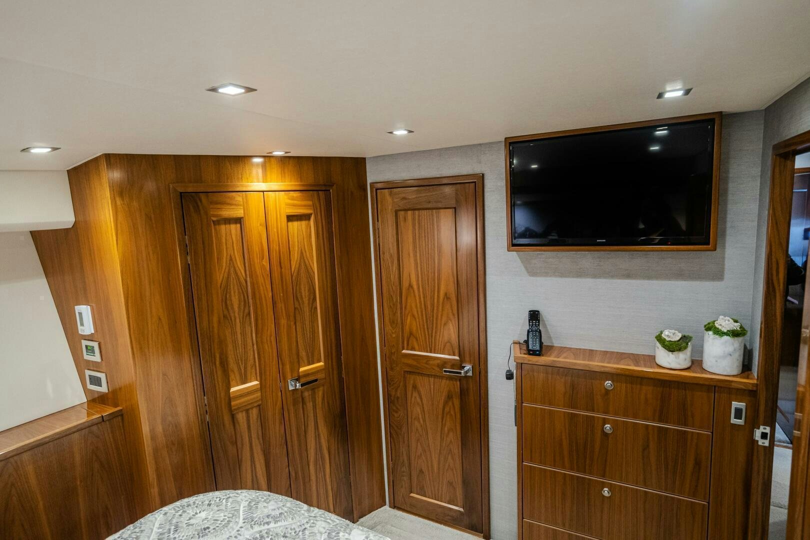 a room with wooden cabinets aboard HOORAY Yacht for Sale