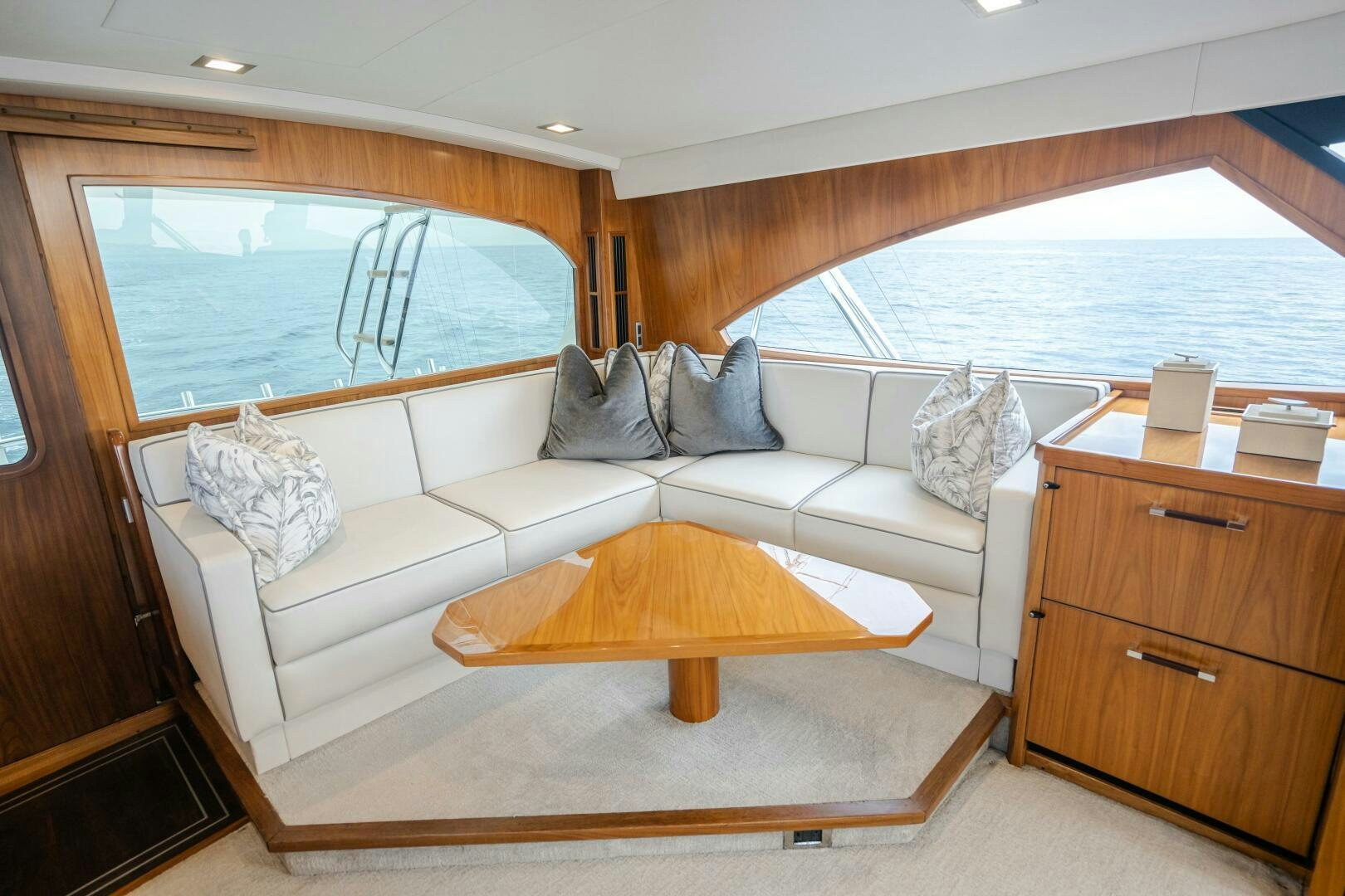 a couch in a room aboard HOORAY Yacht for Sale