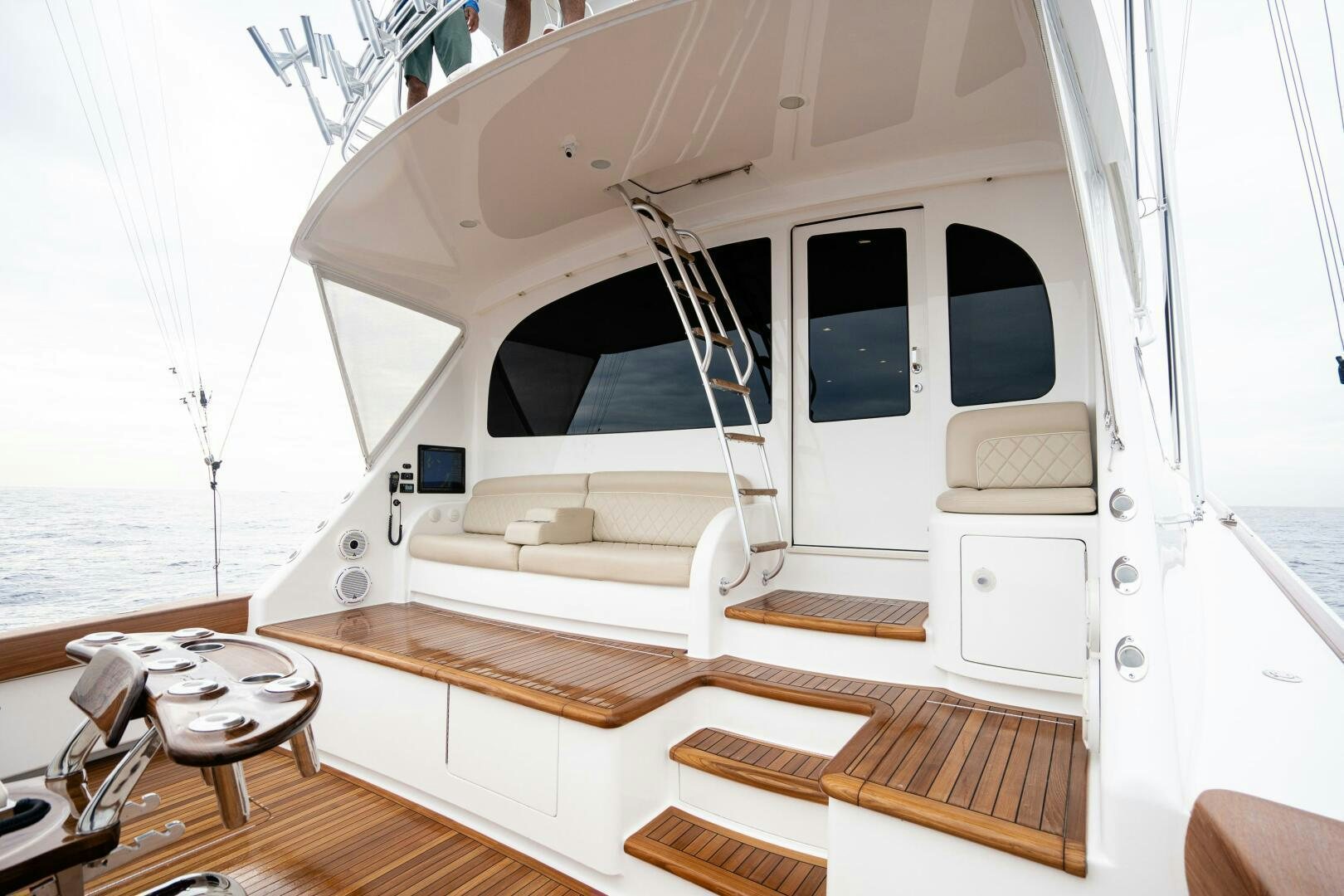 a white boat on a deck aboard HOORAY Yacht for Sale