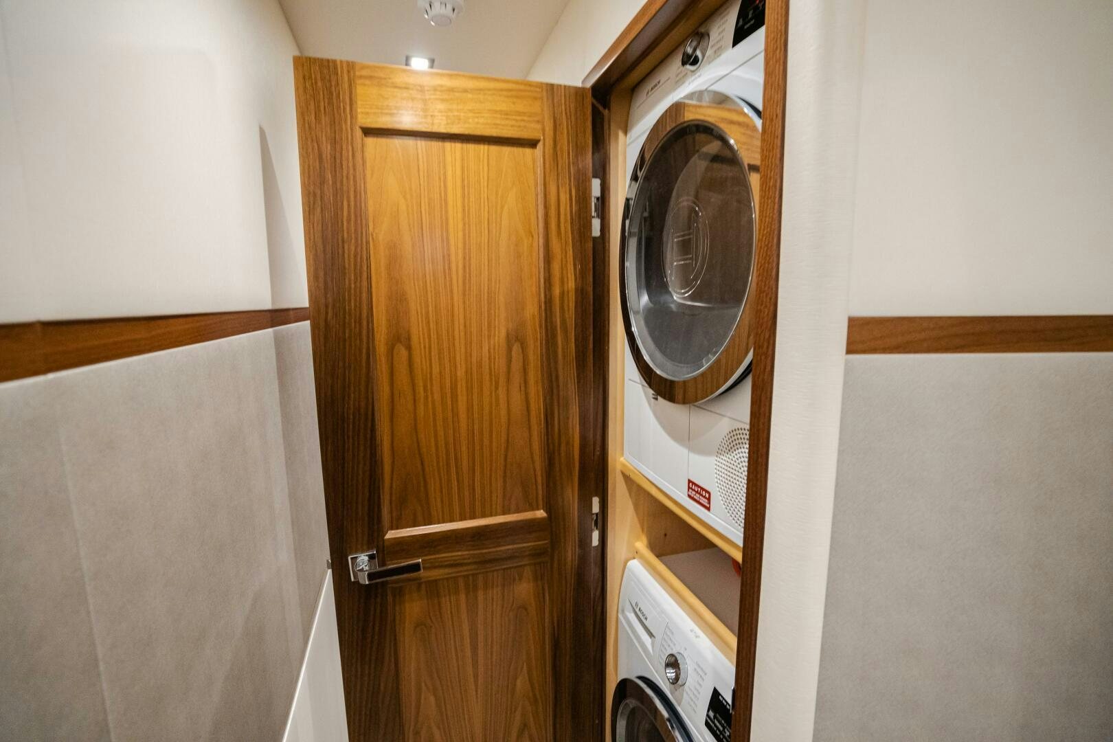 a closet with a mirror aboard HOORAY Yacht for Sale