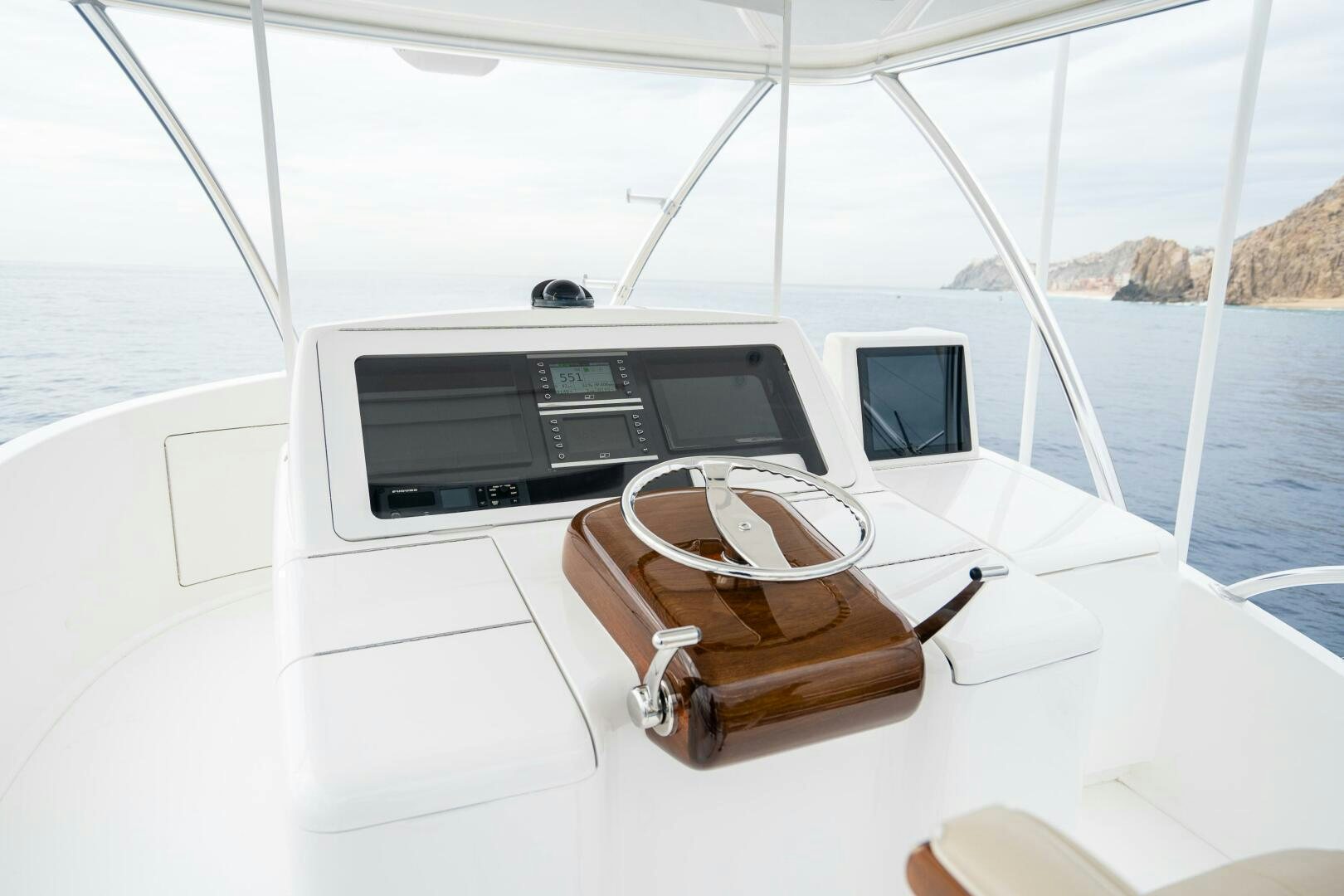 a boat with a laptop and a watch on it aboard HOORAY Yacht for Sale