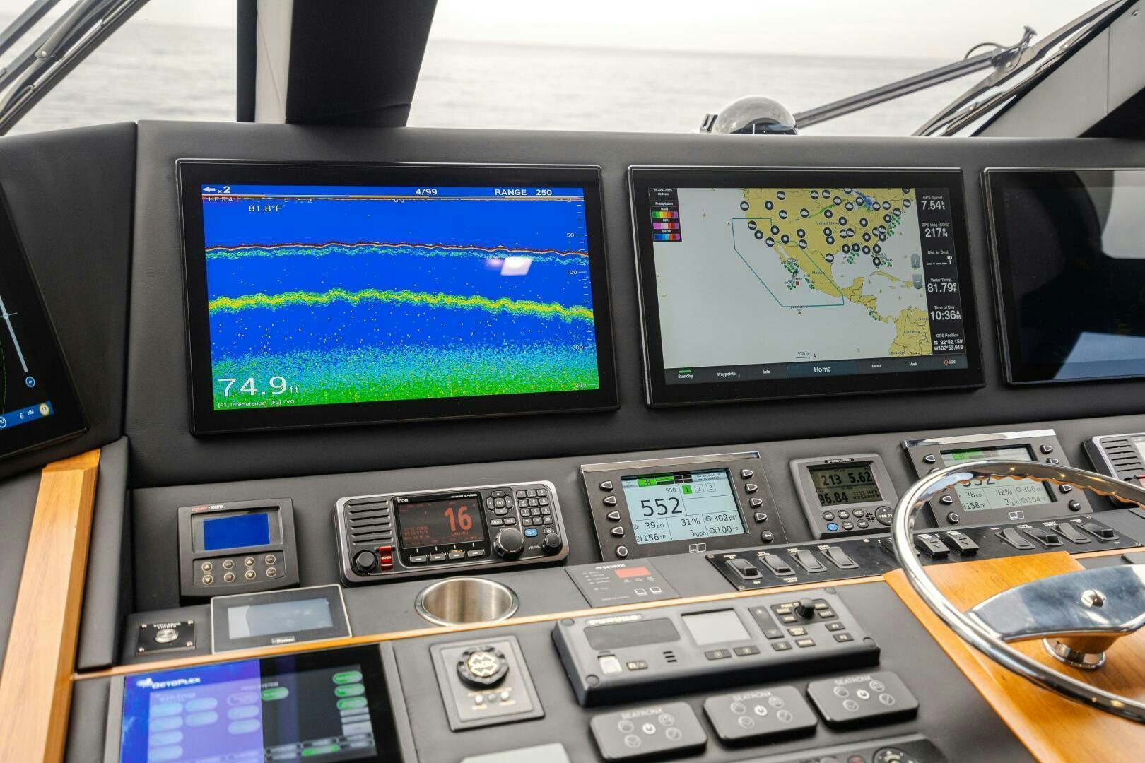 a computer with a screen and buttons aboard HOORAY Yacht for Sale