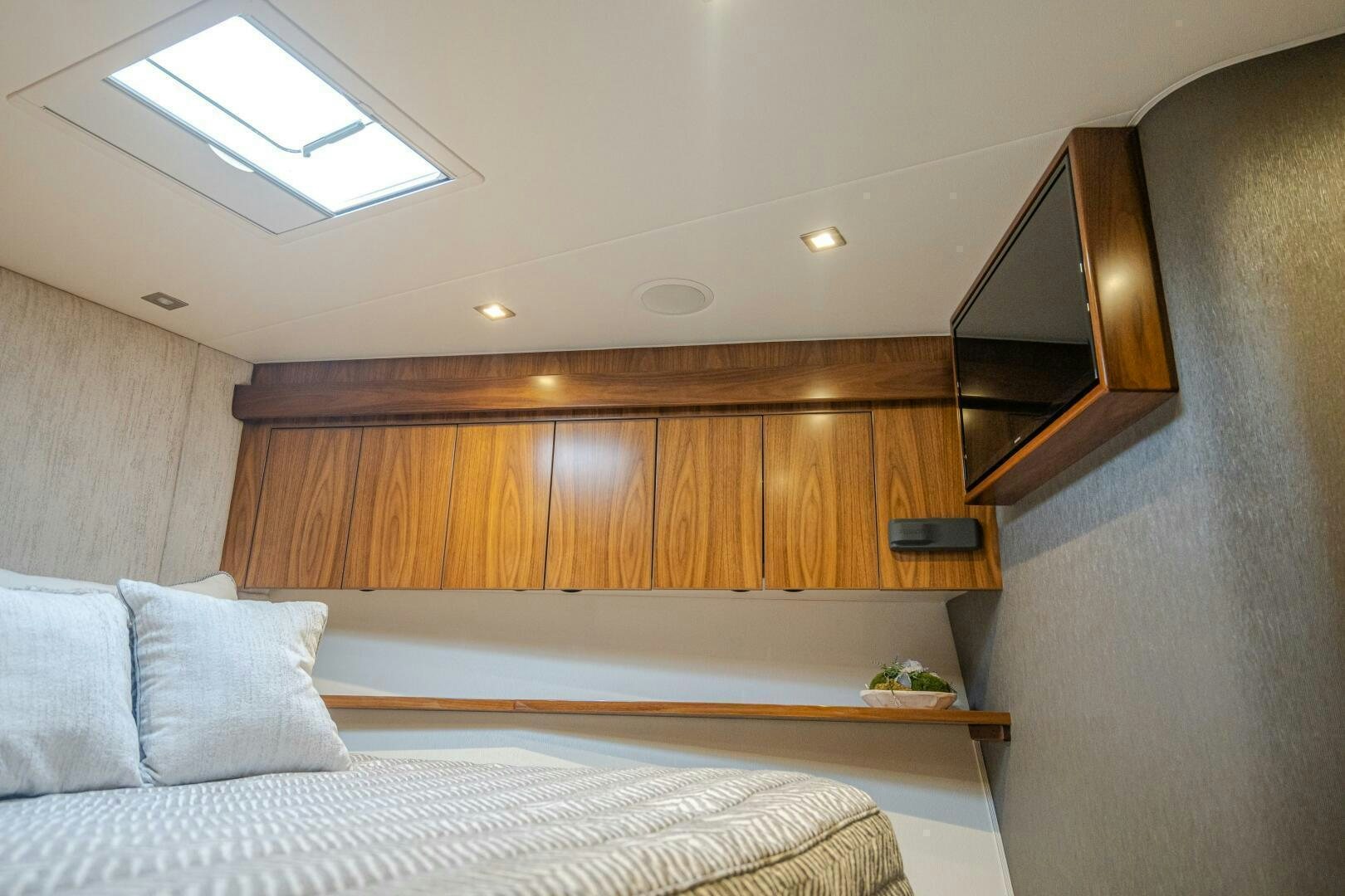 a bed in a room aboard HOORAY Yacht for Sale