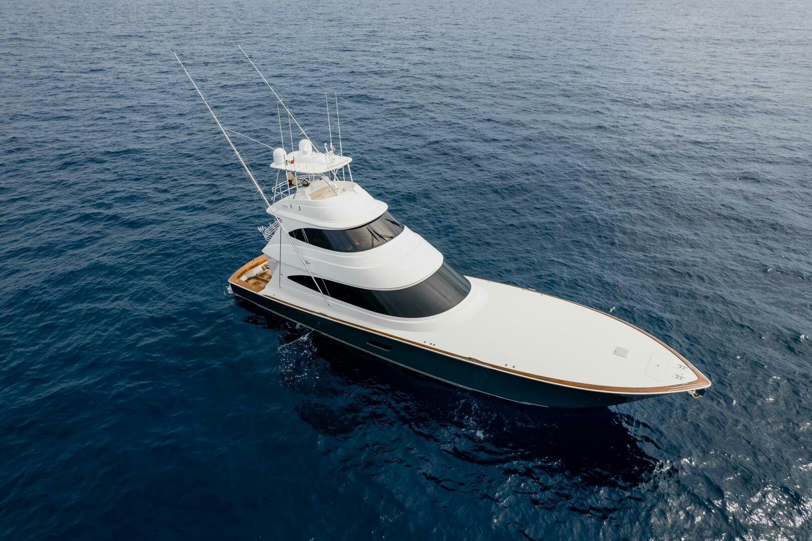 a white boat in the water aboard HOORAY Yacht for Sale