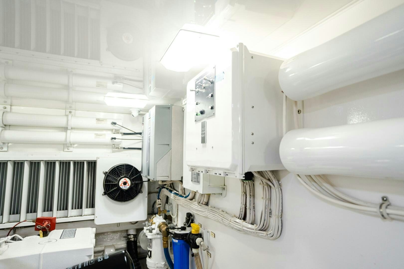 a white machine in a room aboard HOORAY Yacht for Sale