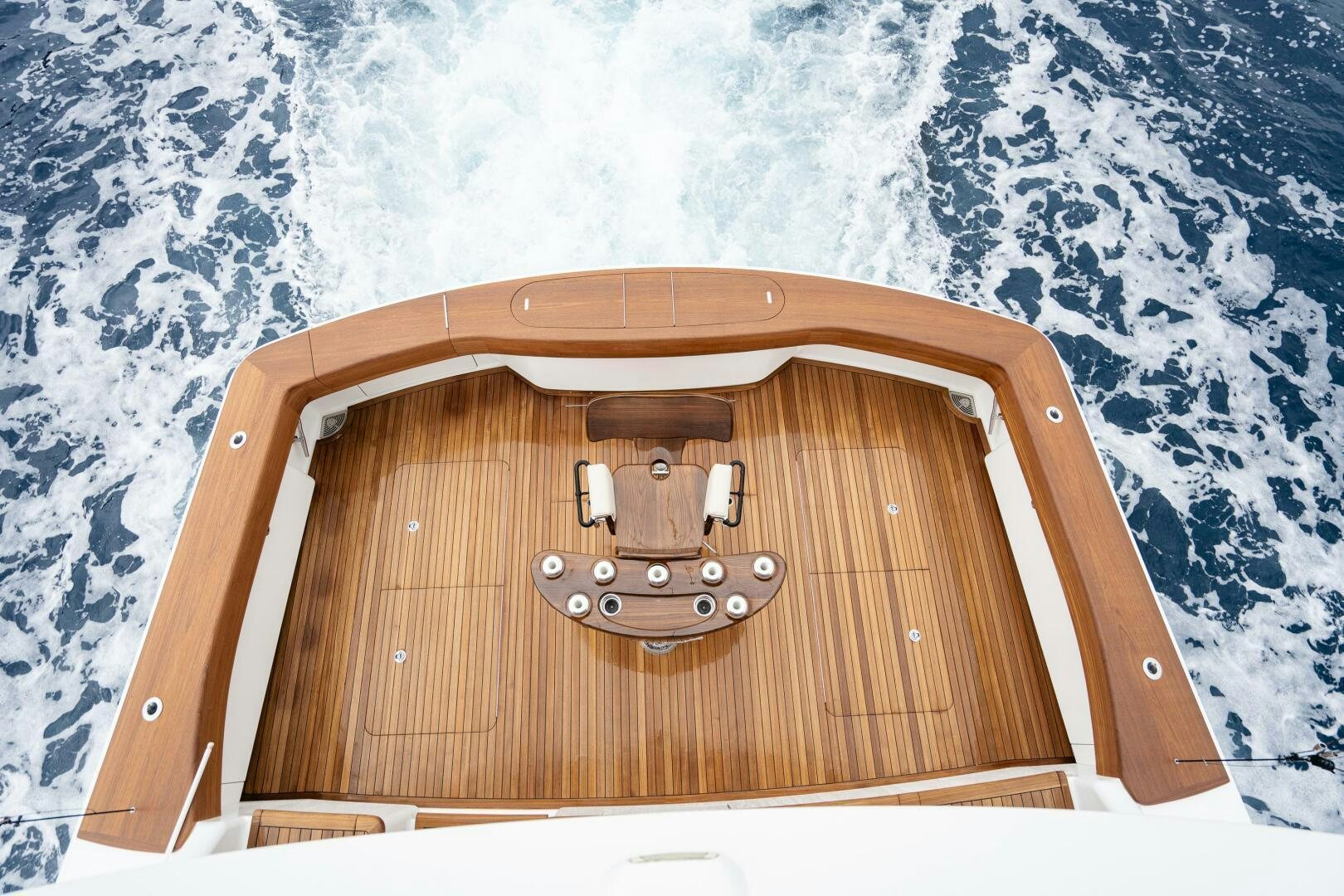 a wood gate with a gold door aboard HOORAY Yacht for Sale