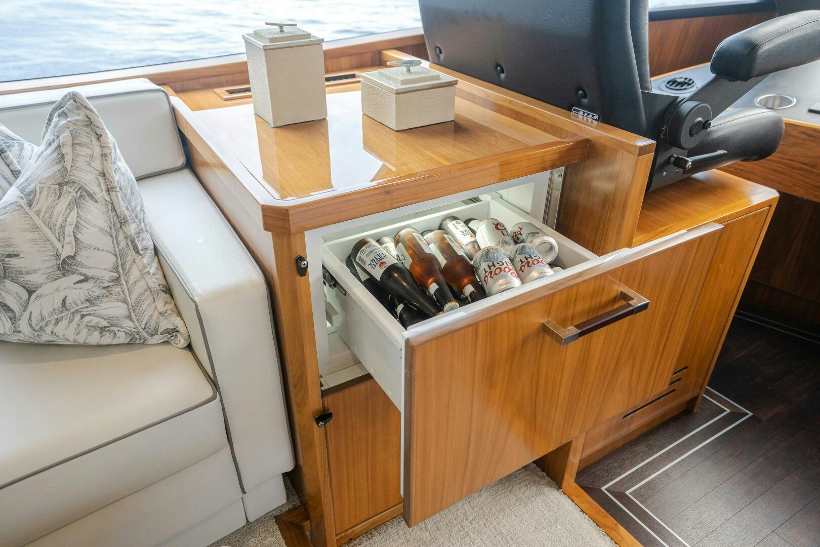 a wooden cabinet with a shelf aboard HOORAY Yacht for Sale