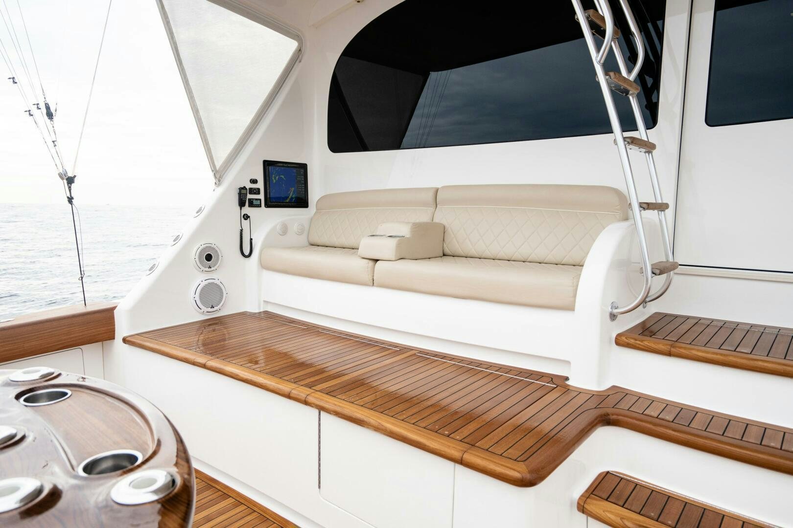 a white couch in a room aboard HOORAY Yacht for Sale