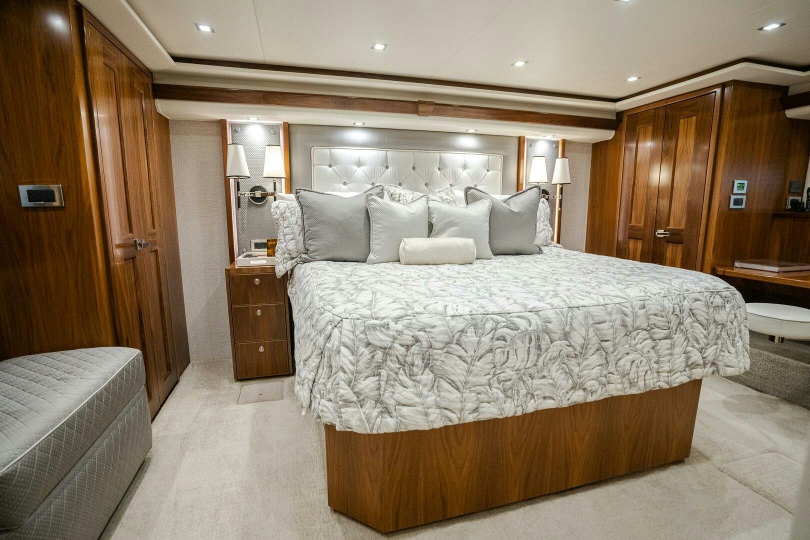 a large bed in a hotel room aboard HOORAY Yacht for Sale