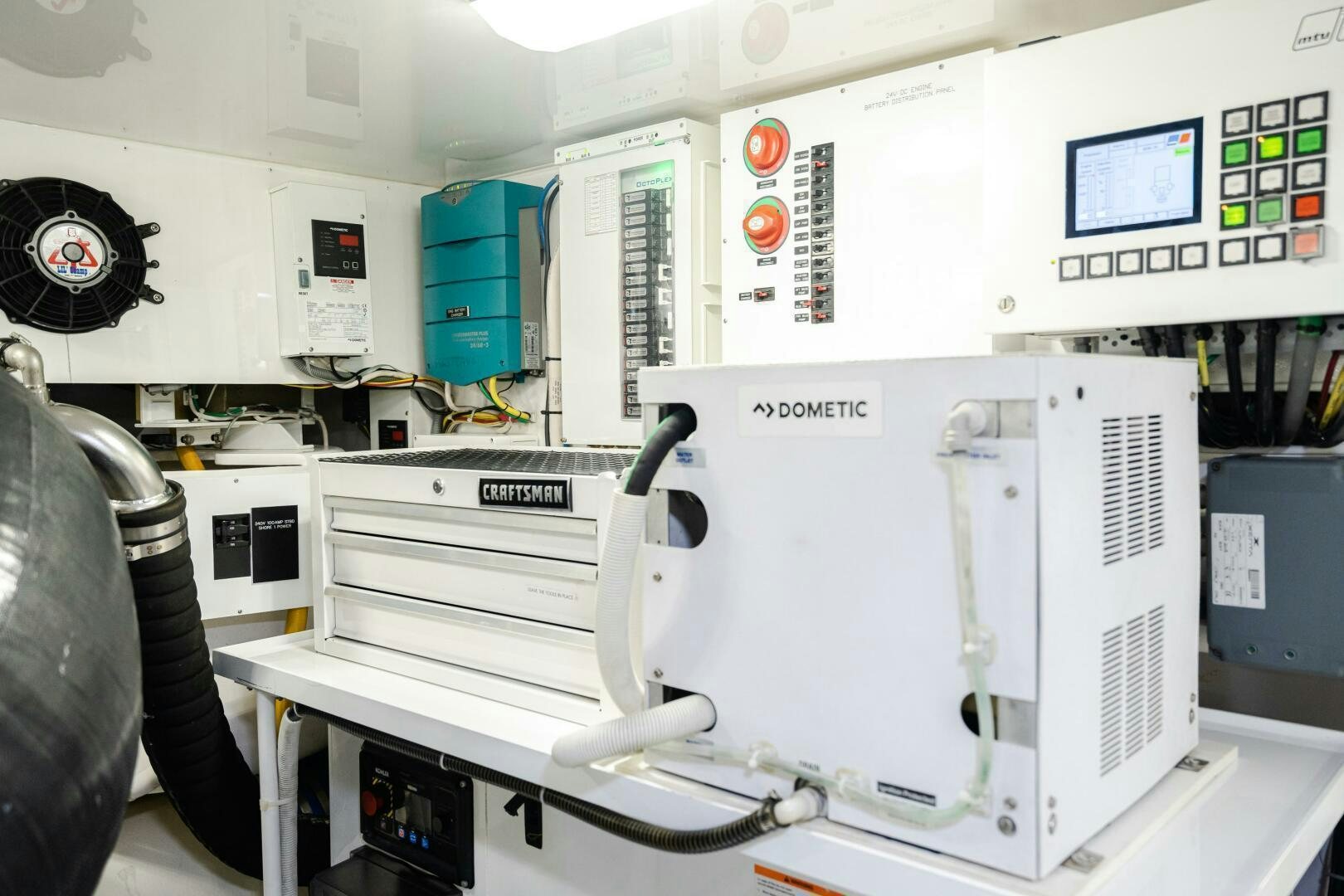 a machine in a room aboard HOORAY Yacht for Sale