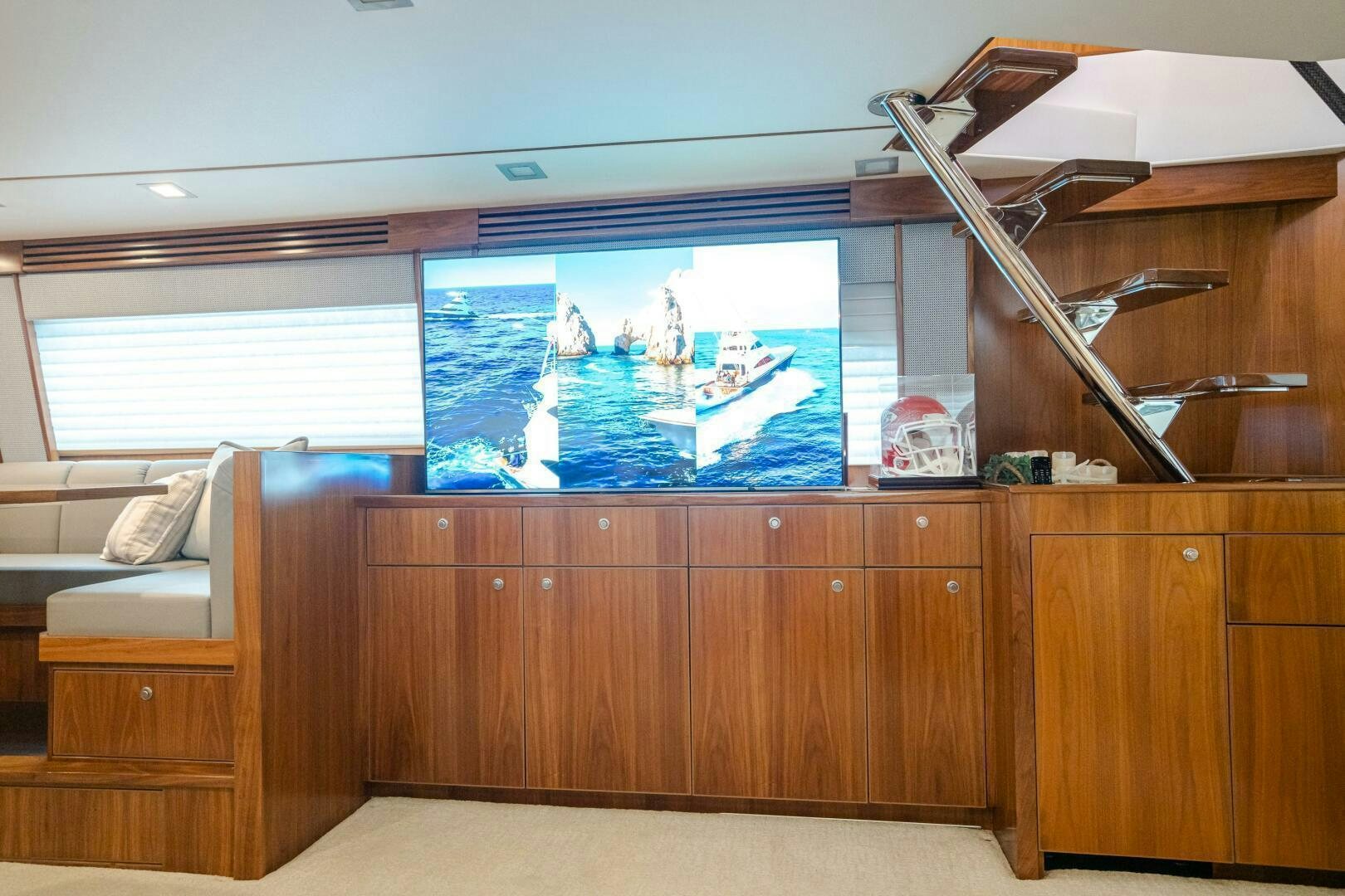 a room with a window and a couch aboard HOORAY Yacht for Sale