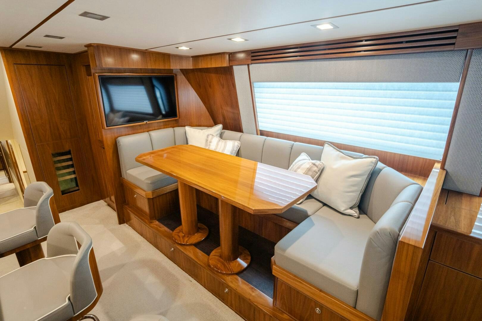 a room with a couch and a table aboard HOORAY Yacht for Sale