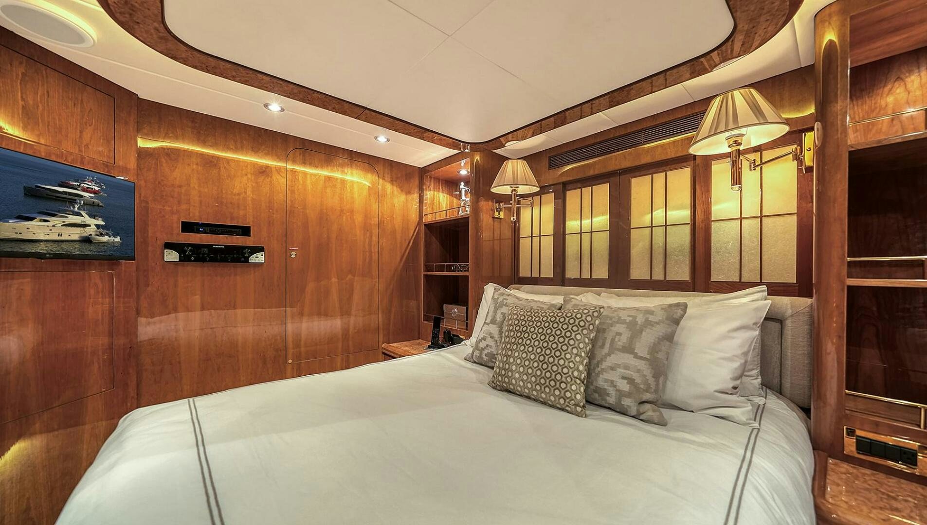 a bed with pillows aboard FANTASEA Yacht for Sale
