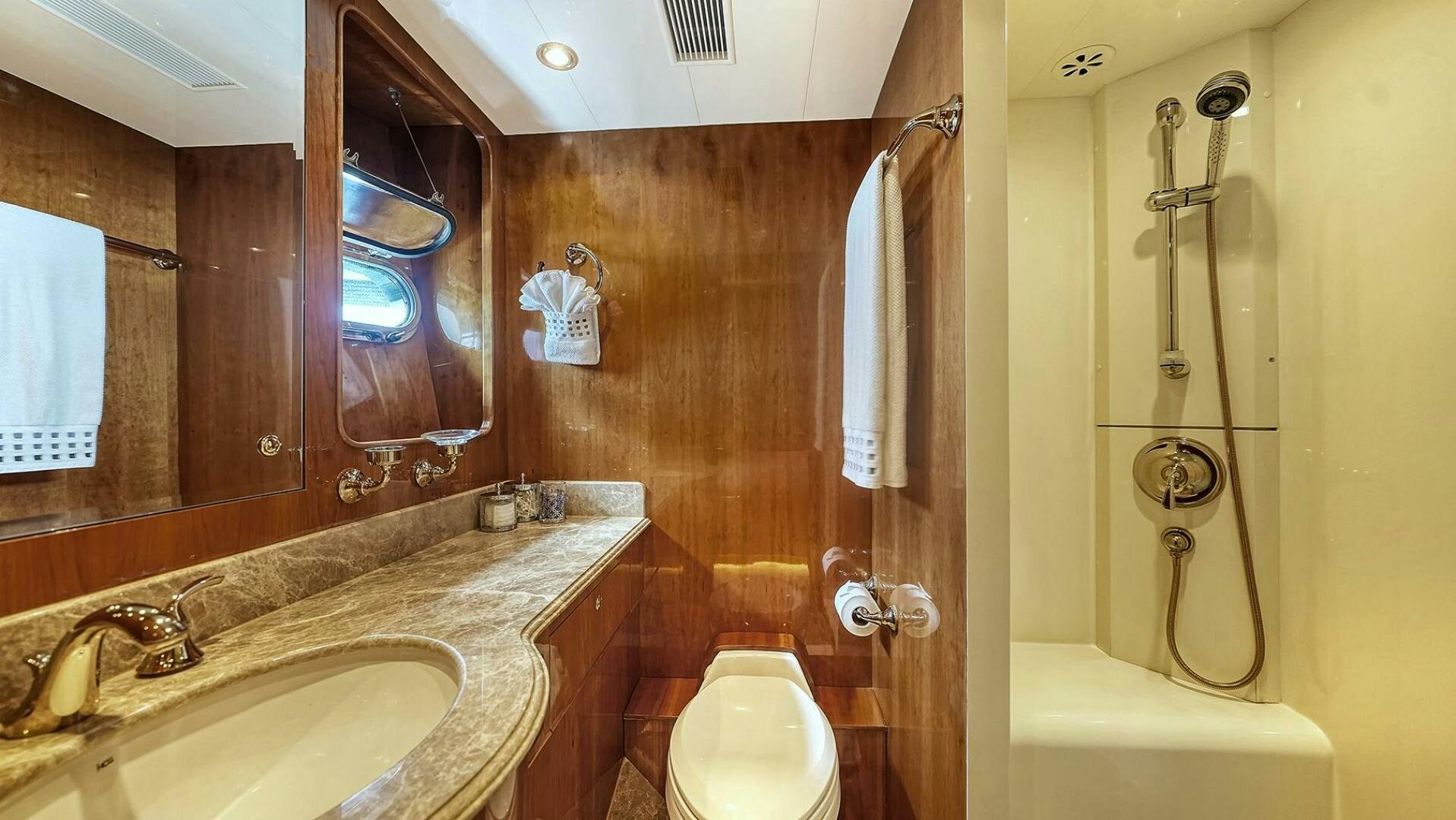 a bathroom with a sink and a toilet aboard FANTASEA Yacht for Sale