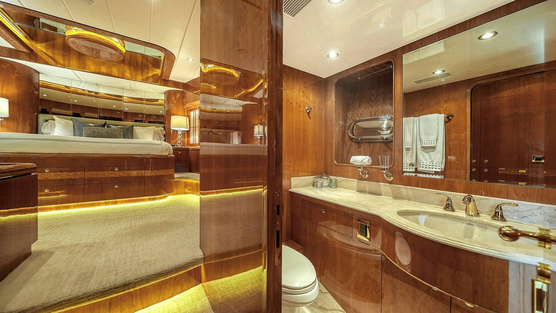 a bathroom with a large mirror aboard FANTASEA Yacht for Sale
