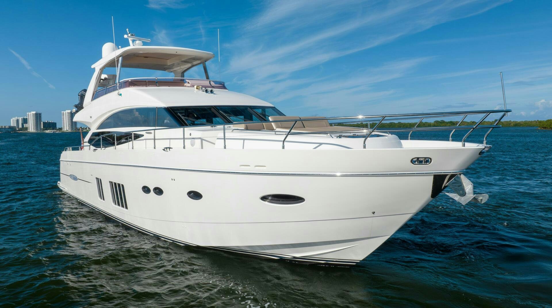 a white yacht on the water aboard MISS DORI Yacht for Sale